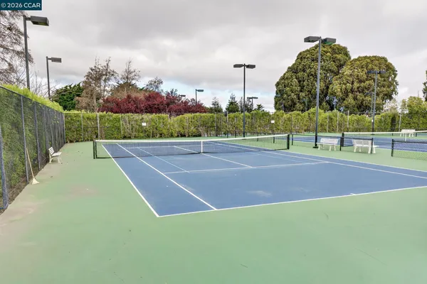 an aerial view of a house with a swimming pool
