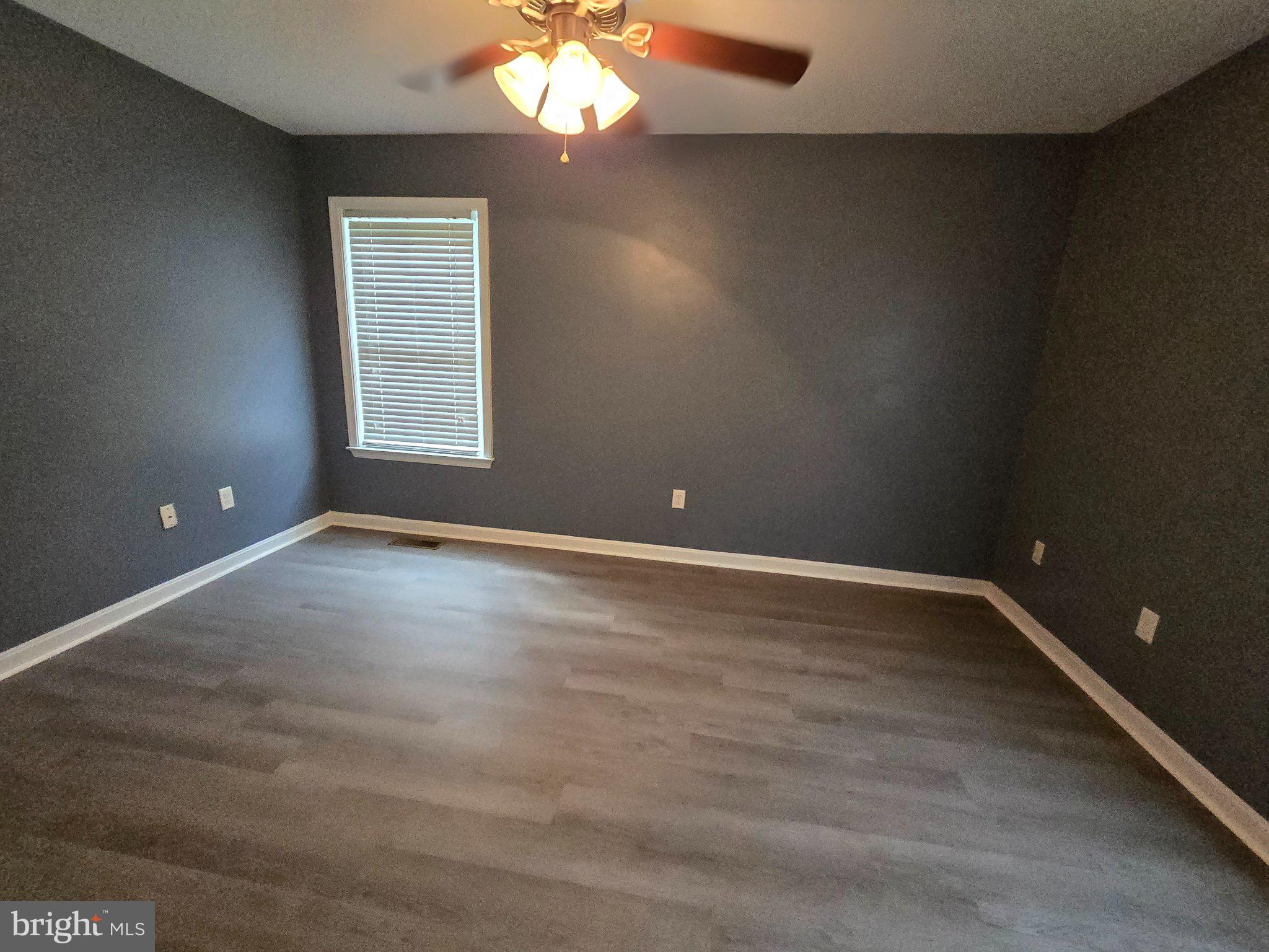 8981 Sharptown Road Laurel, DE 19956 - Photo 21 of 34 Spacious room with modern charm.