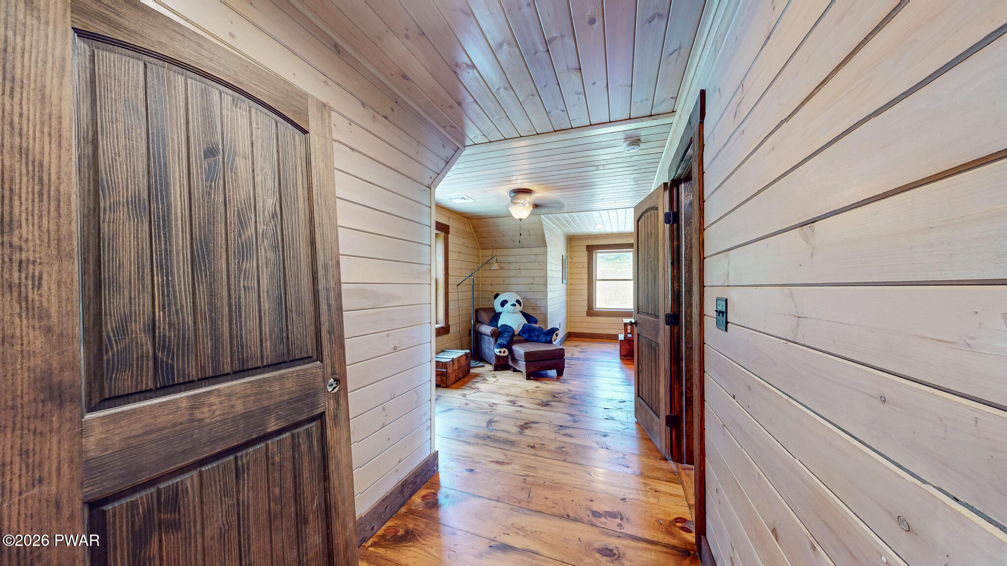149 Sheards Road Milanville, PA 18443 - Photo 43 of 57 a view of a porch with wooden floor and furniture