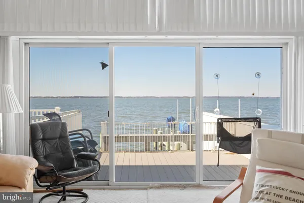 a view of a workspace with furniture