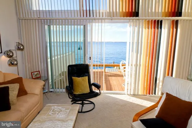 a kitchen with stainless steel appliances a stove a sink and a microwave