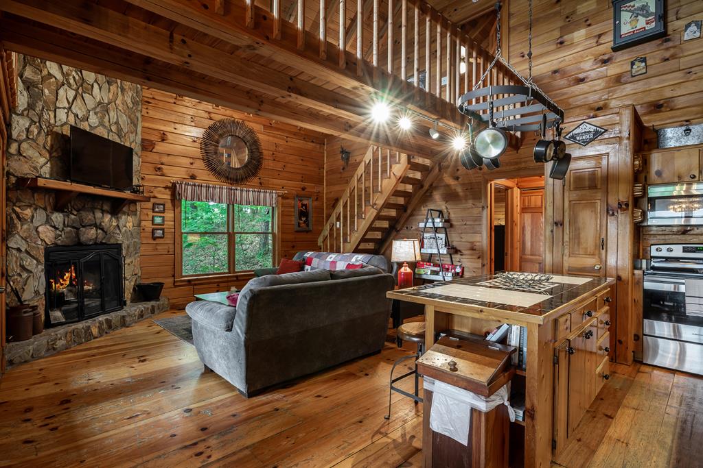 54 Ascherman Court Blue Ridge, GA 30513 - Photo 13 of 48 a view of a kitchen with furniture and a fireplace