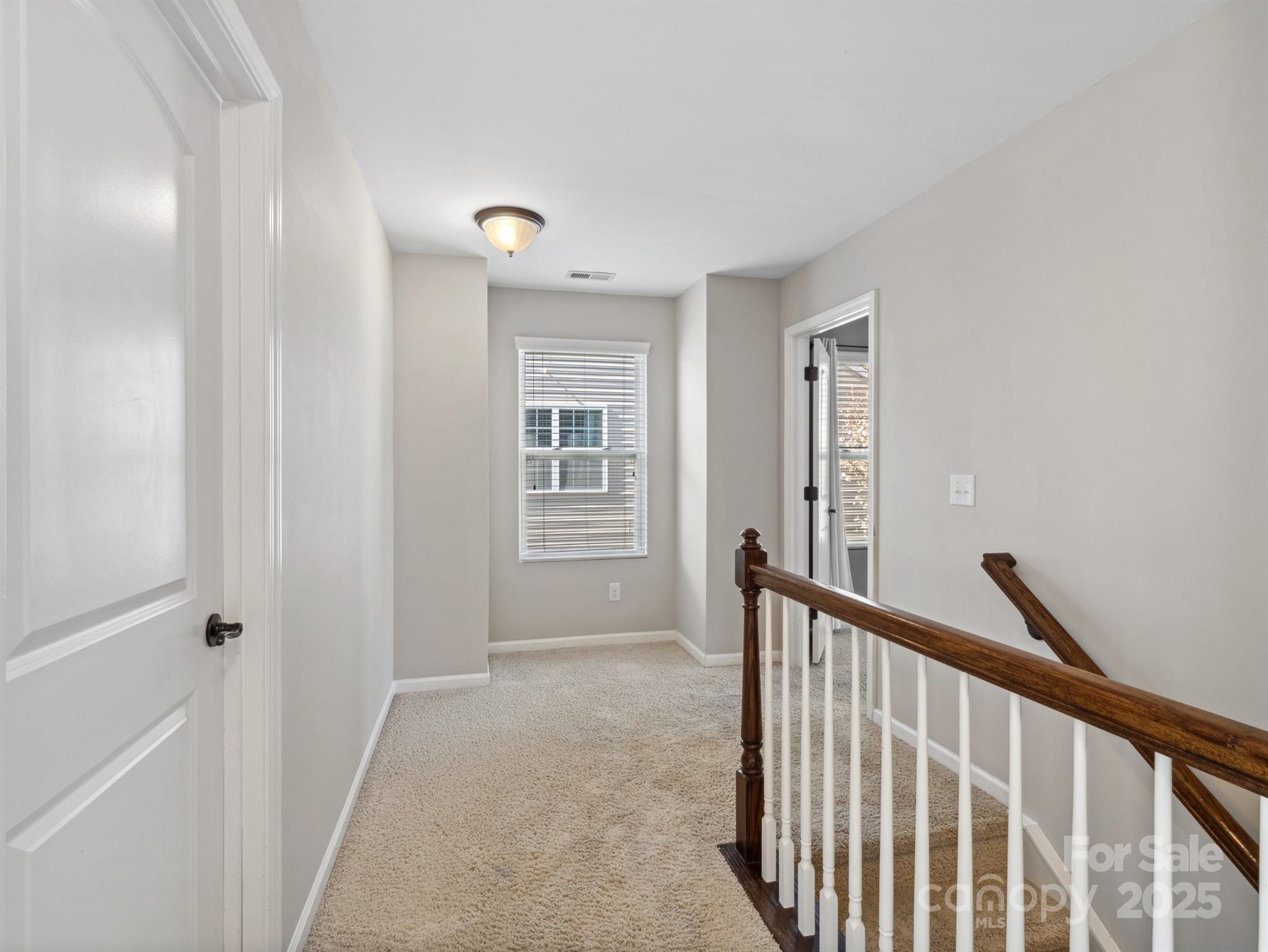 79357 Ridgehaven Road Lancaster, SC 29720 - Photo 17 of 42 a view of a hallway with windows
