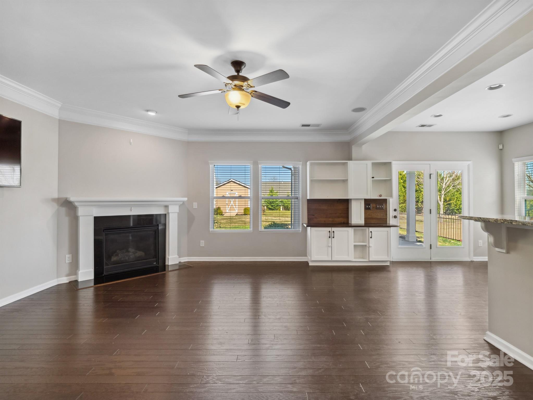 79357 Ridgehaven Road Lancaster, SC 29720 - Photo 5 of 42 a view of an empty room with a window and fireplace