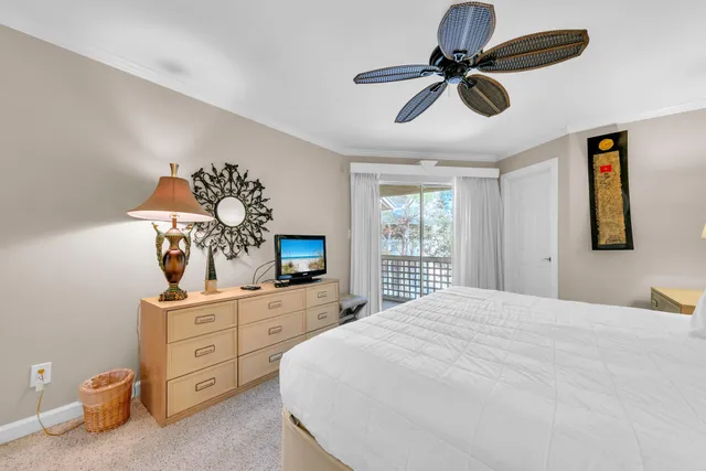 a room with wooden floor and furniture