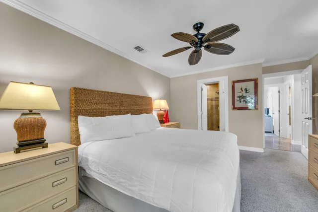 a bathroom with double vanity and a mirror