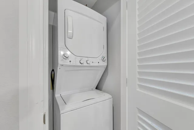 a bedroom with a bed and a walk in closet