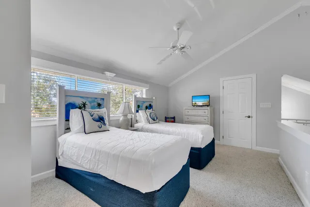 a view of a swimming pool with an outdoor space and seating area