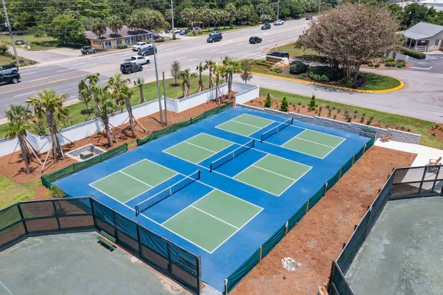 a pathway of a house with a yard