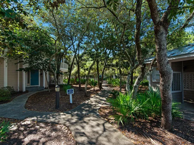 a swimming pool with outdoor seating yard and barbeque oven