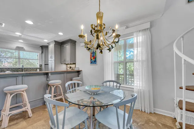 a kitchen with a sink cabinets and window