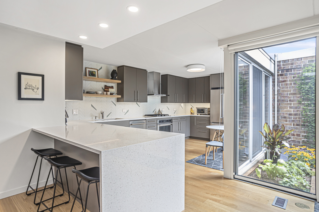 1739 Seton Road Northbrook, IL 60062 - Photo 11 of 31 a kitchen with stainless steel appliances kitchen island granite countertop a sink and cabinets