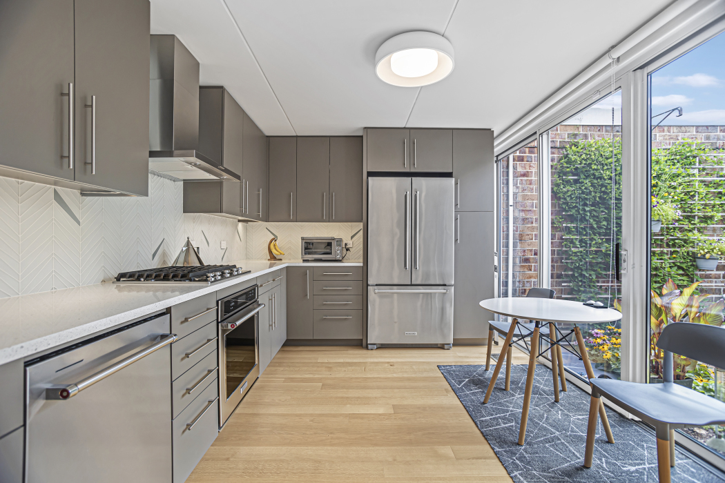 1739 Seton Road Northbrook, IL 60062 - Photo 14 of 31 a kitchen with a stove a refrigerator and furniture