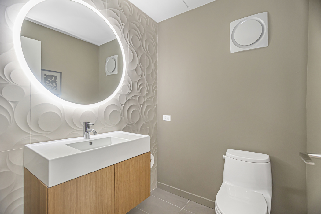 1739 Seton Road Northbrook, IL 60062 - Photo 16 of 31 a bathroom with a sink mirror and toilet