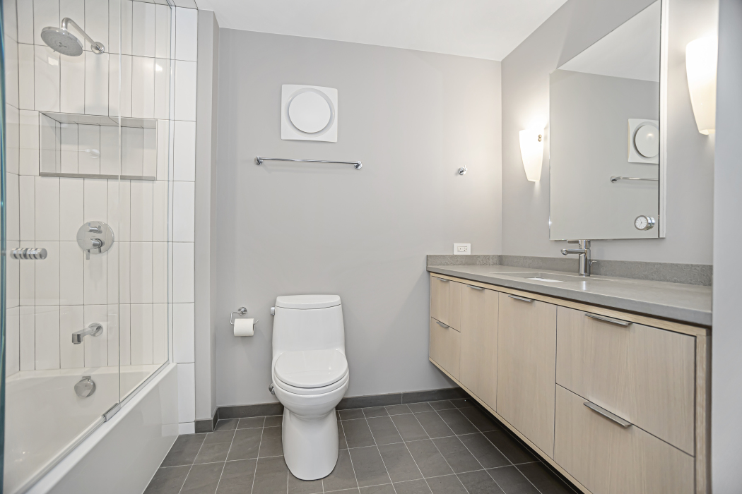 1739 Seton Road Northbrook, IL 60062 - Photo 21 of 31 a bathroom with a sink a toilet and shower