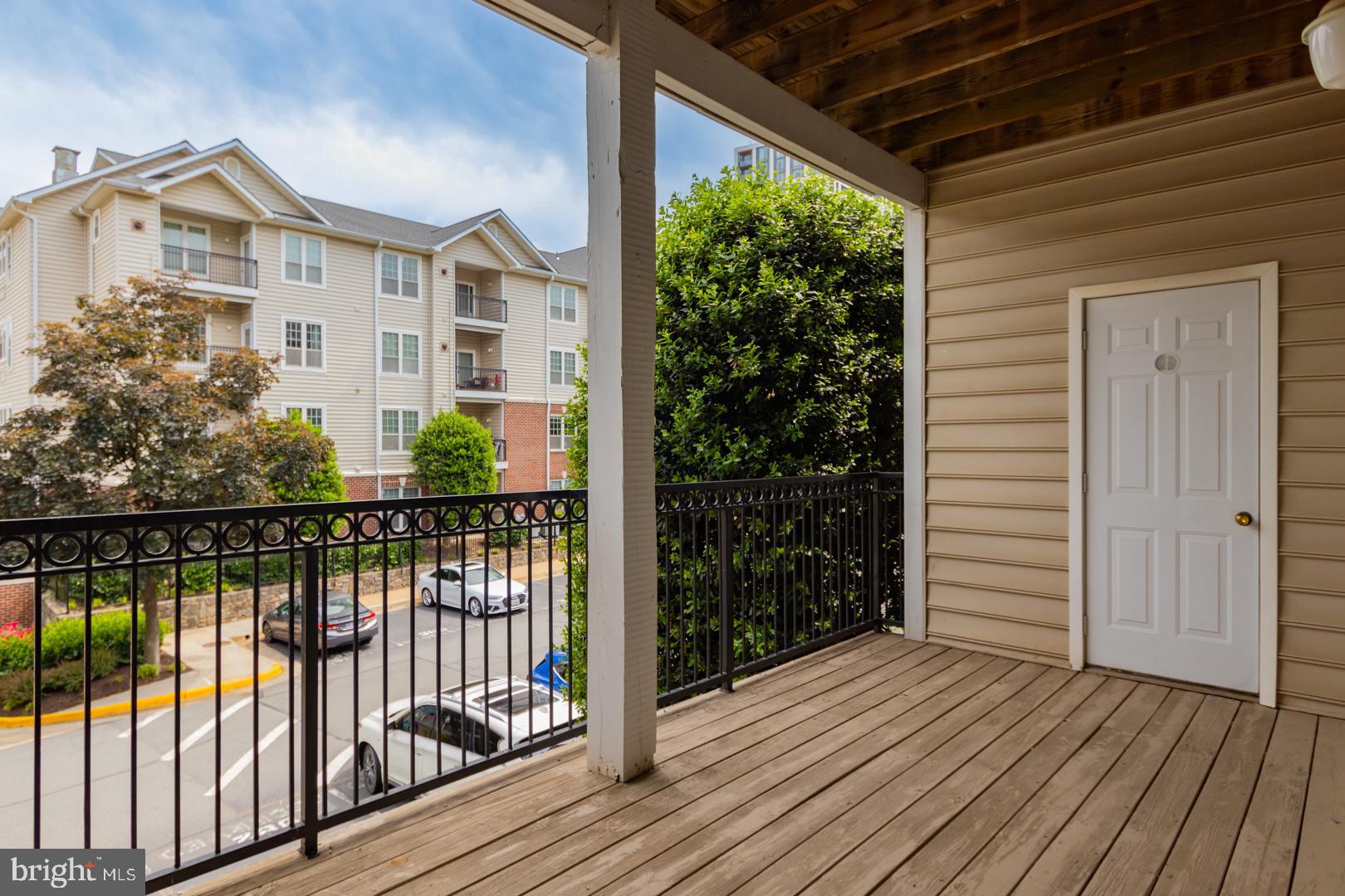 1600 Spring Gate Dr., Unit 2207 McLean, VA 22102 - Photo 28 of 32 a view of a balcony with wooden floor