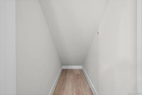 a view of wooden floor in a bathroom