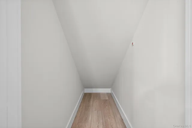 a view of wooden floor in a bathroom