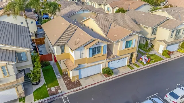an aerial view of a house with a garden and shower