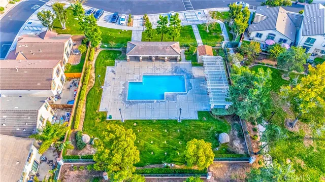 aerial view of a house with a garden