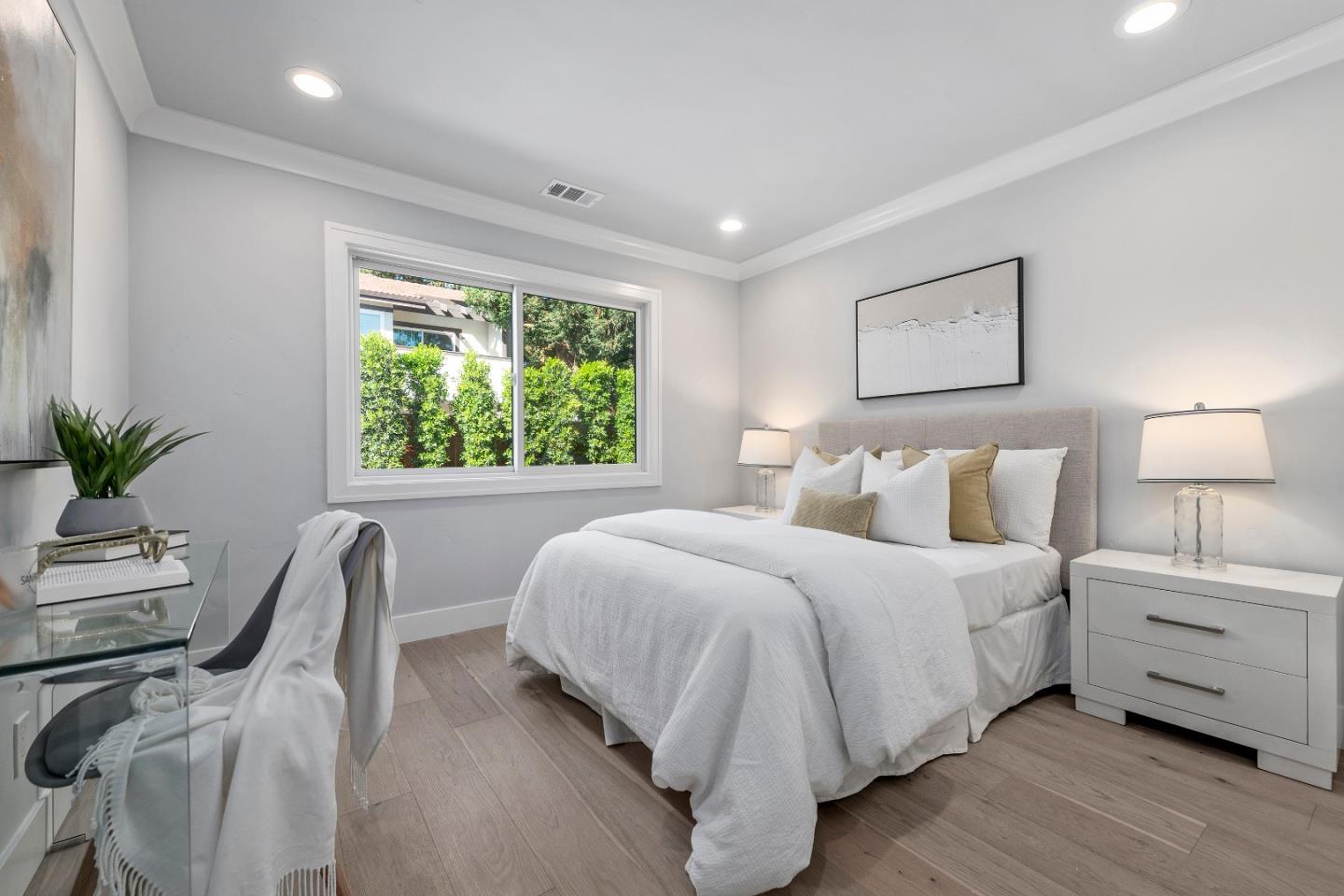 2647 Phillips Avenue Santa Clara, CA 95051 - Photo 12 of 22 a bedroom with a bed and a chair