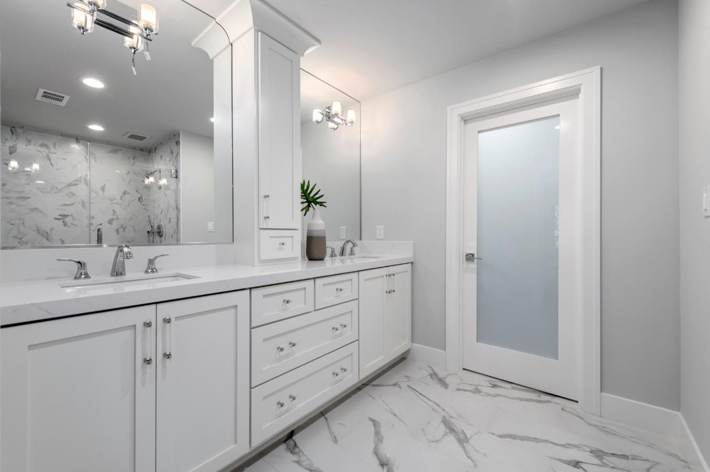 2647 Phillips Avenue Santa Clara, CA 95051 - Photo 16 of 22 a bathroom with double sink and a mirror
