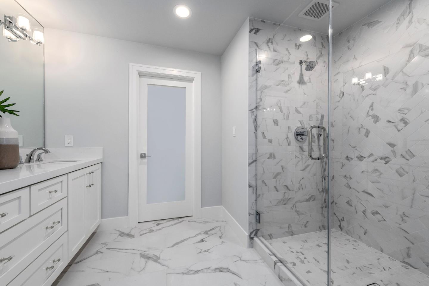 2647 Phillips Avenue Santa Clara, CA 95051 - Photo 17 of 22 a bathroom with shower sink and cabinets