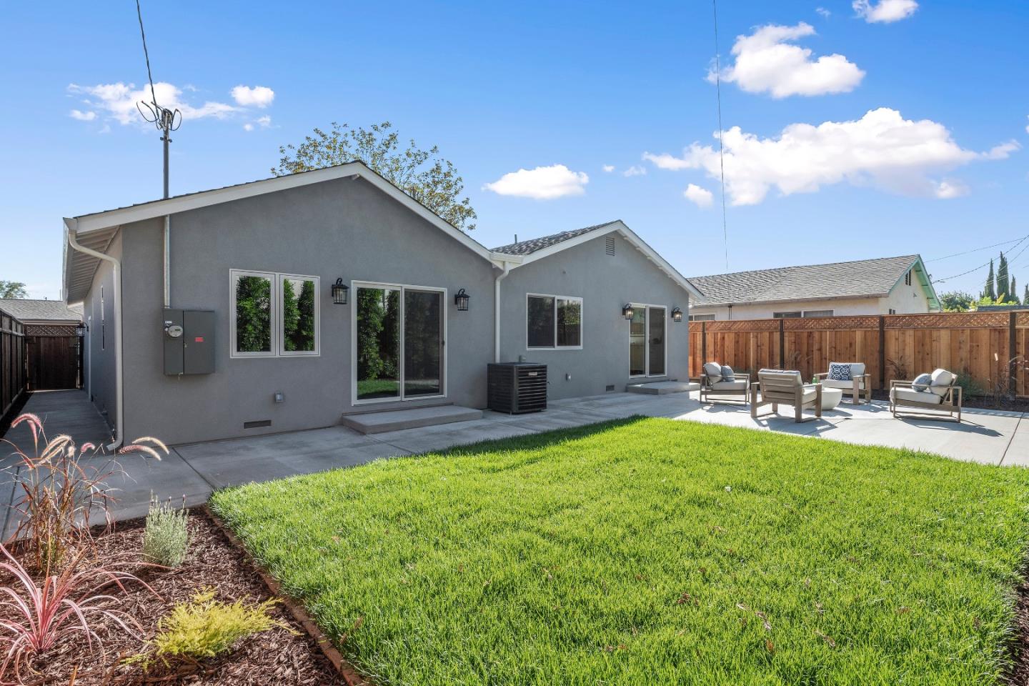 2647 Phillips Avenue Santa Clara, CA 95051 - Photo 21 of 22 a view of a house with backyard porch and sitting area