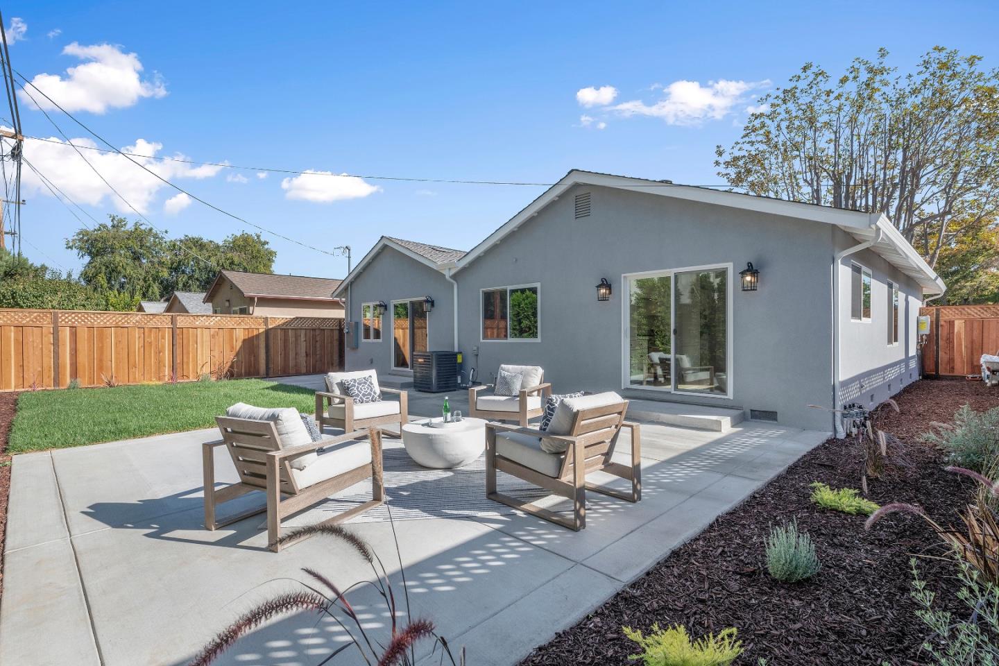 2647 Phillips Avenue Santa Clara, CA 95051 - Photo 22 of 22 a view of a house with backyard sitting area and garden
