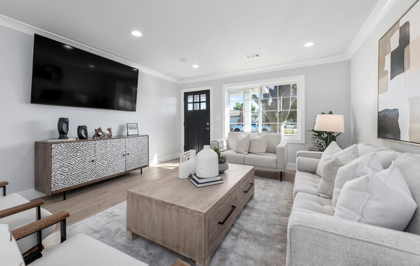 2647 Phillips Avenue Santa Clara, CA 95051 - Photo 4 of 22 a living room with furniture and a flat screen tv