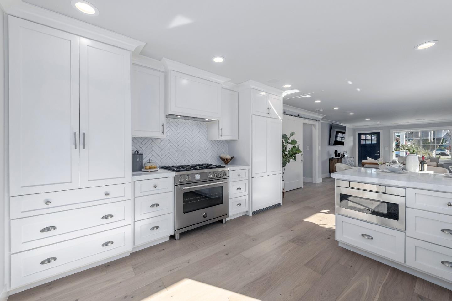 2647 Phillips Avenue Santa Clara, CA 95051 - Photo 8 of 22 a kitchen with granite countertop a stove and a sink