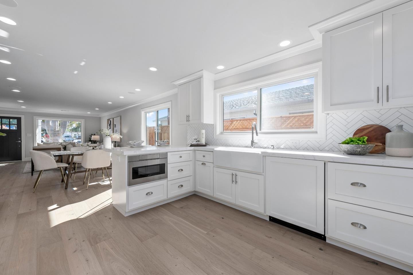2647 Phillips Avenue Santa Clara, CA 95051 - Photo 9 of 22 a kitchen with white cabinets and white appliances