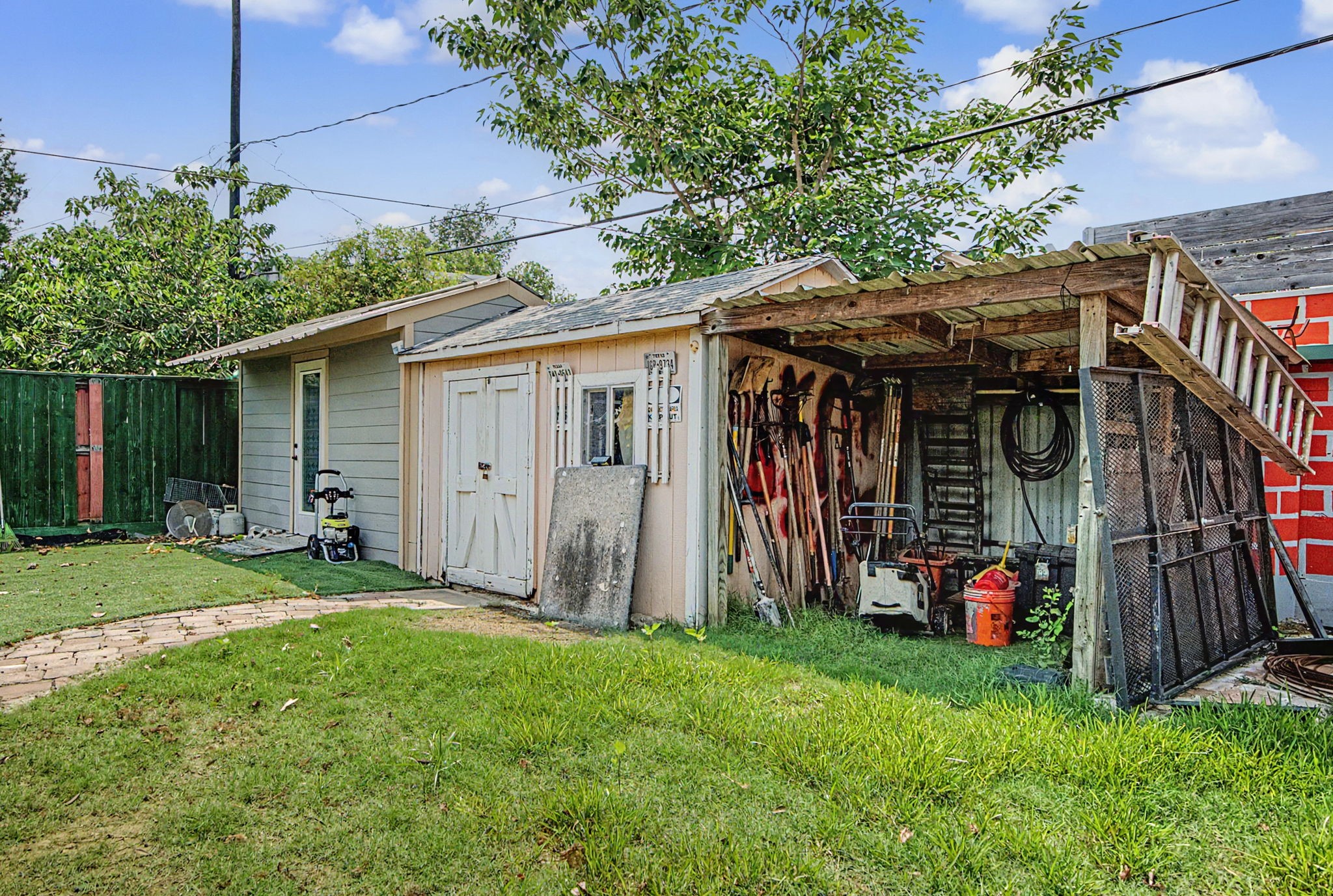 10034 Alfred Lane Houston, TX 77041 - Photo 49 of 50 Detached storage buildings offer endless possibilities for tools, equipment, and creative pursuits.