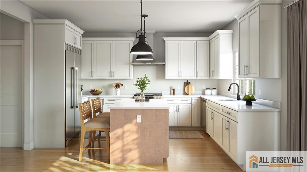 372 Matchaponix Road Old Bridge, NJ 08857 - Photo 2 of 3 a kitchen with a sink window and cabinets