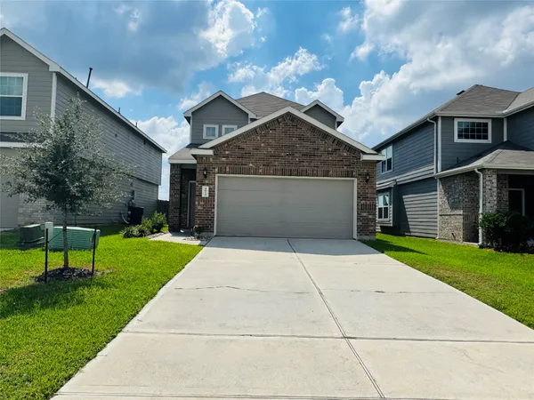 a front view of house with yard