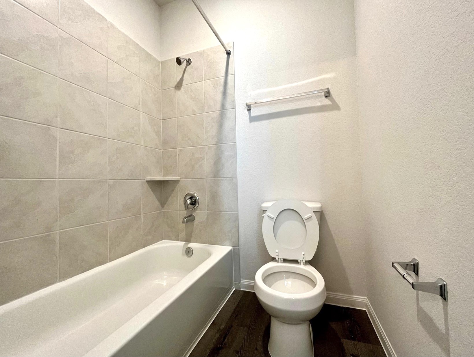 4814 Blue Jacaranda Way Spring, TX 77373 - Photo 15 of 19 a bathroom with a toilet sink and bathtub