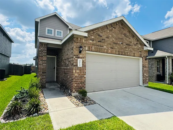 a view of a house with a garage
