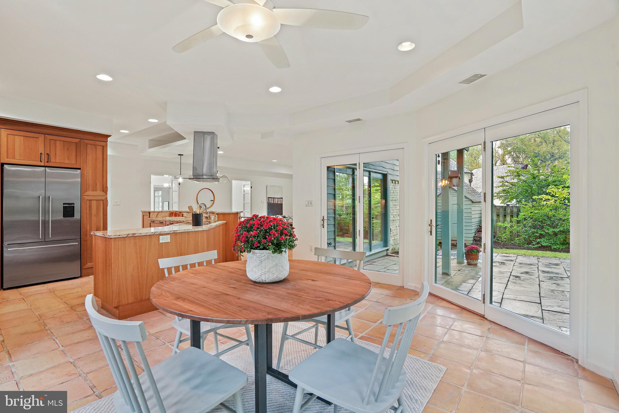 3112 Rolling Road Chevy Chase, MD 20815 - Photo 12 of 38 a dining room with furniture and wooden floor