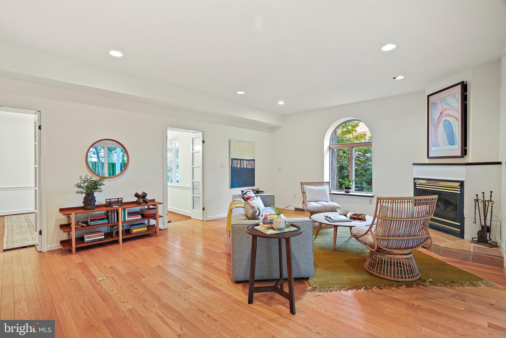 3112 Rolling Road Chevy Chase, MD 20815 - Photo 14 of 38 a living room with furniture and a wooden floor