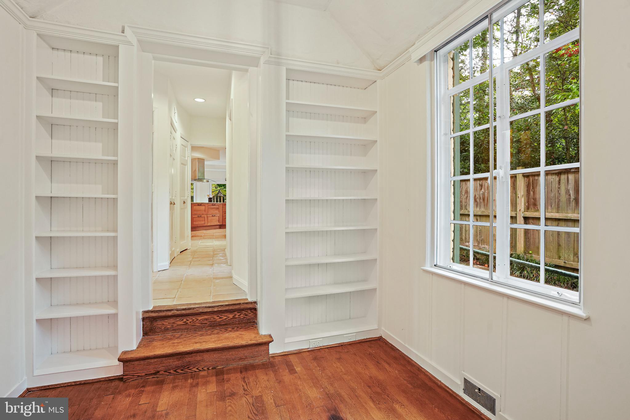 3112 Rolling Road Chevy Chase, MD 20815 - Photo 18 of 38 a view of a livingroom with wooden floor and windows