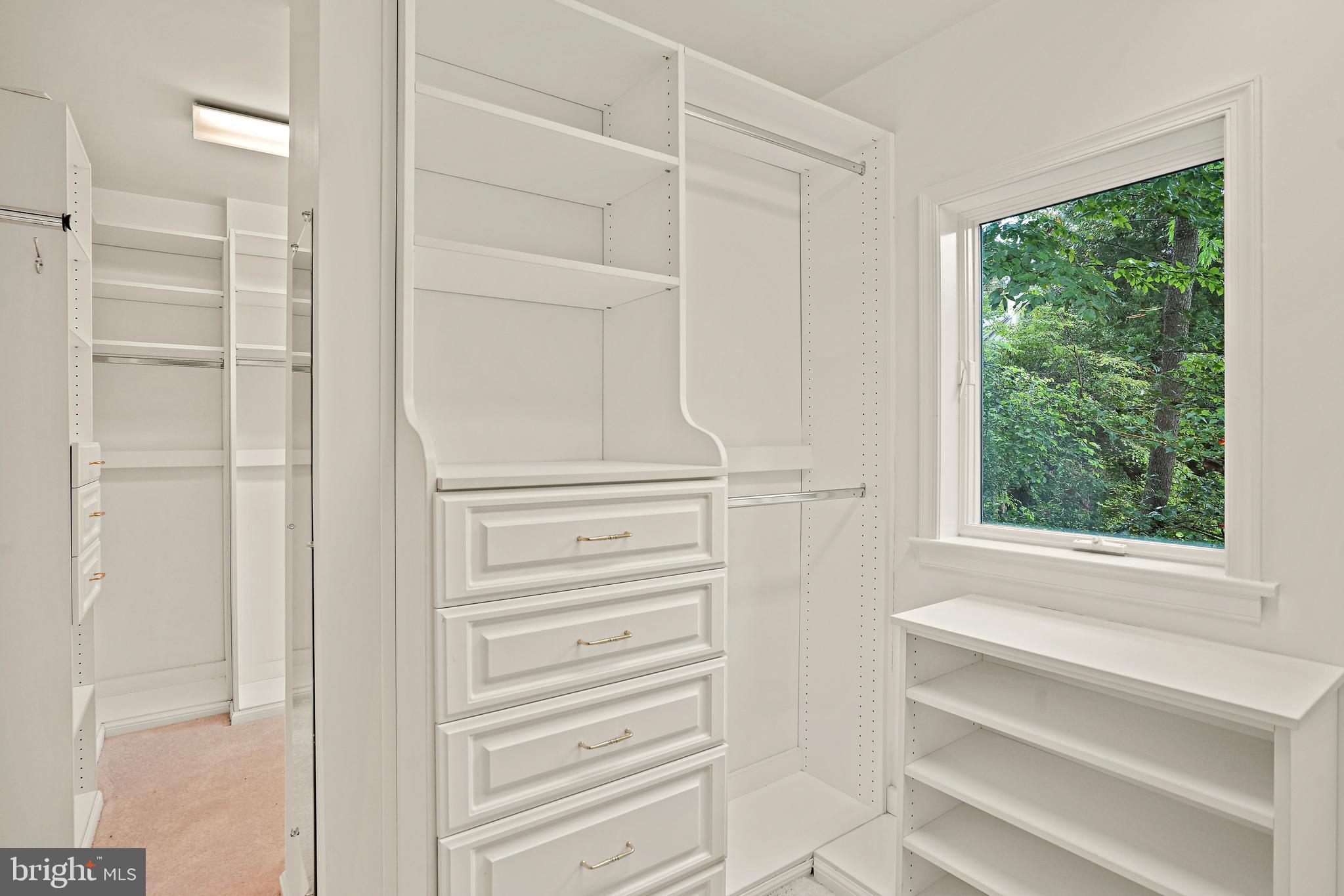 3112 Rolling Road Chevy Chase, MD 20815 - Photo 23 of 38 a view of walk in closet with empty racks