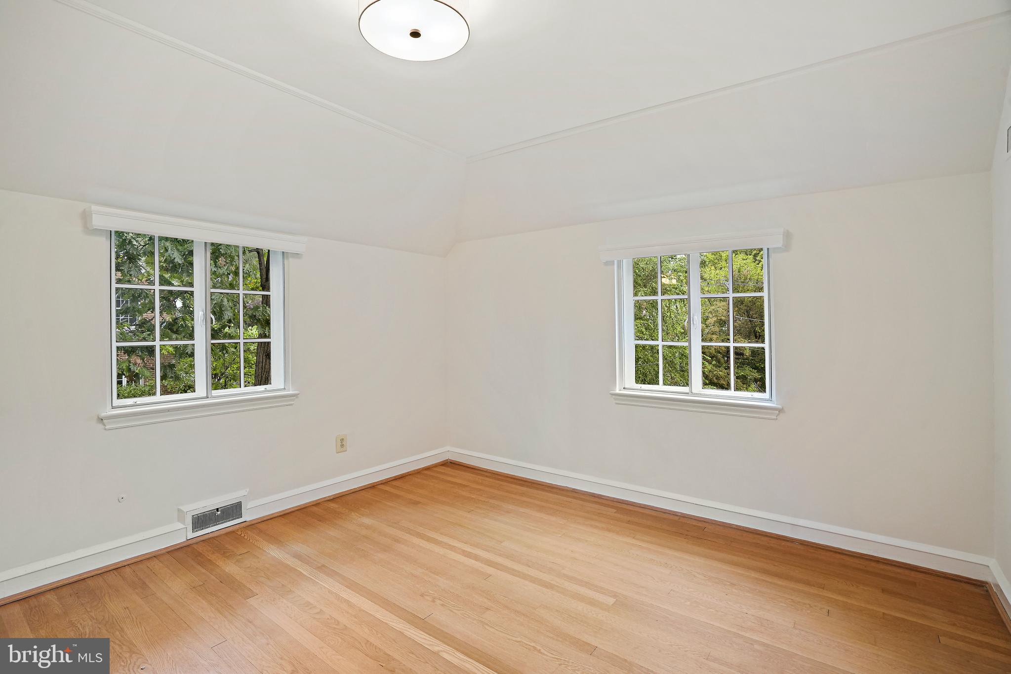 3112 Rolling Road Chevy Chase, MD 20815 - Photo 27 of 38 an empty room with a window