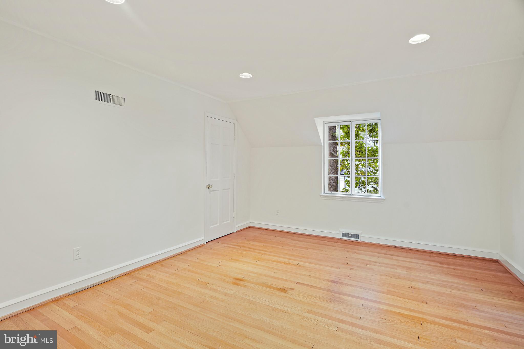 3112 Rolling Road Chevy Chase, MD 20815 - Photo 30 of 38 an empty room with a window