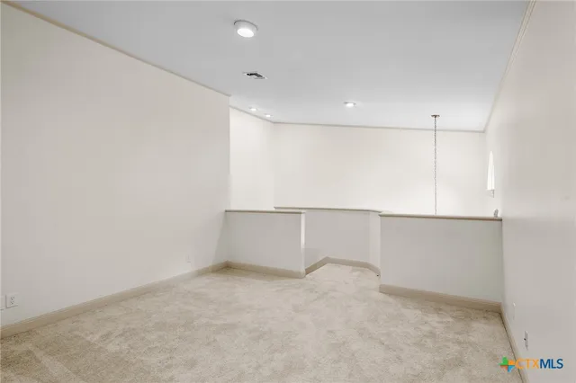 a view of a back yard of the house