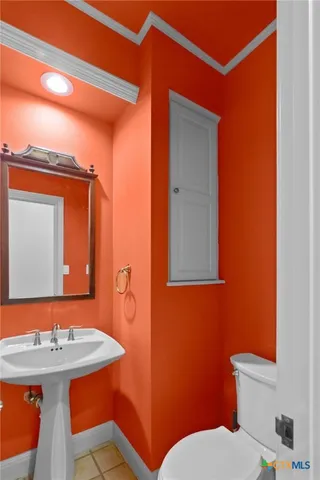 a kitchen with stainless steel appliances a stove sink and cabinets