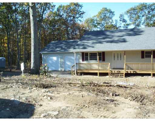 Lot 9 Shaw Road Wales, MA 01081 - Photo 4 of 13 a house with trees in the background