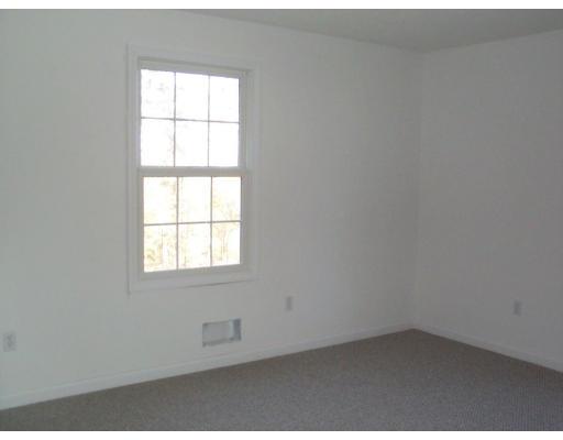 Lot 9 Shaw Road Wales, MA 01081 - Photo 8 of 13 an empty room with a window