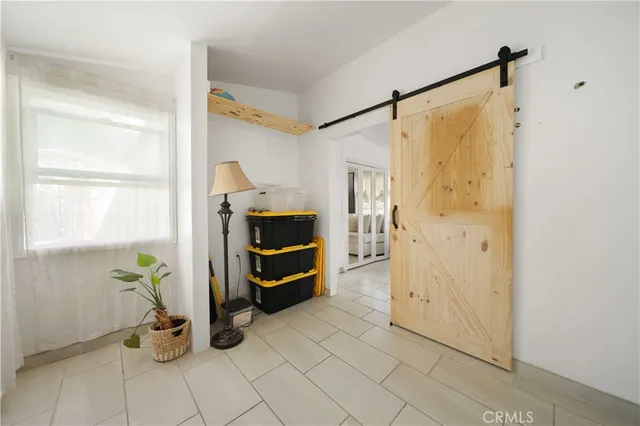 a view of walk in closet with window