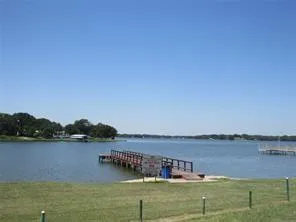 a view of a city with a lake