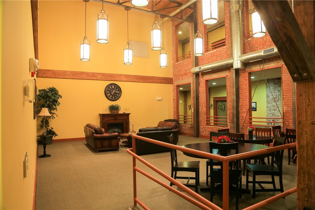 99 Allen Street, Unit 117 Woonsocket, RI 02895 - Photo 20 of 25 The condo complex has a large common space for meetings or quiet reading.